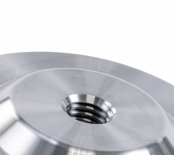 Plaque adaptatrice adhésive pour pied de table